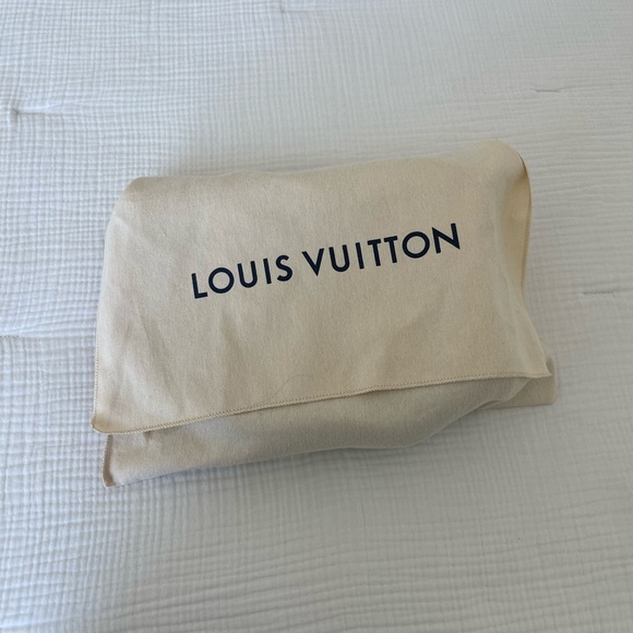 Authentic Louis Vuitton Lock Me Mini Backpack Black and Gold - Picture 16 of 16